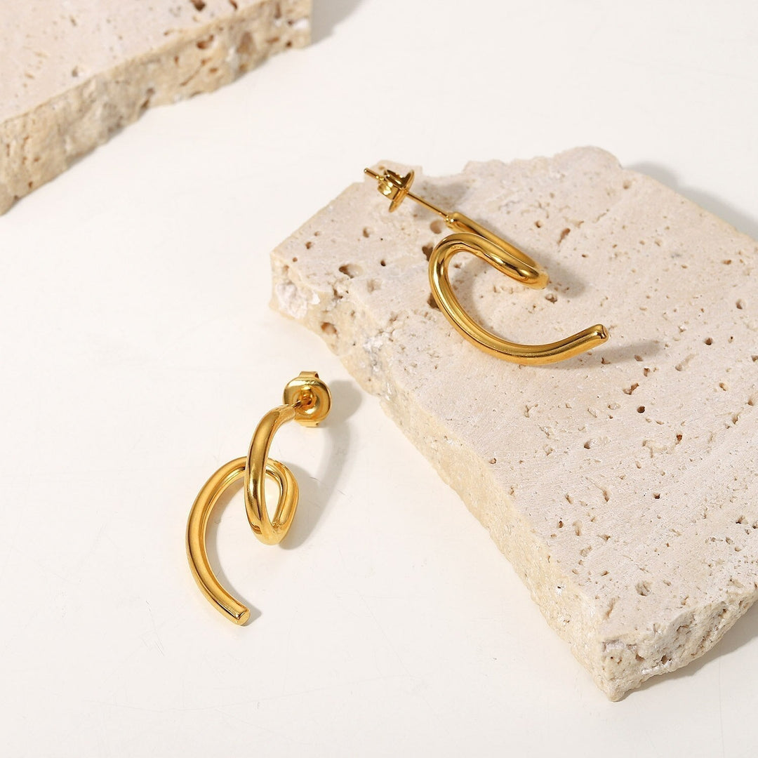 Boucles d'oreilles Volute Plaqué Or 18K