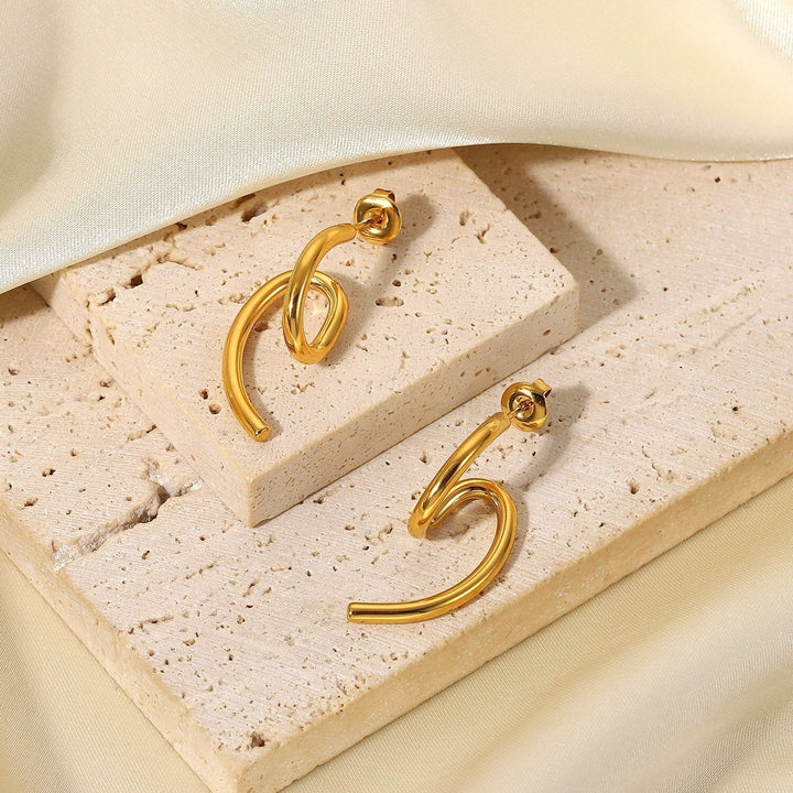 Boucles d'oreilles Volute Plaqué Or 18K